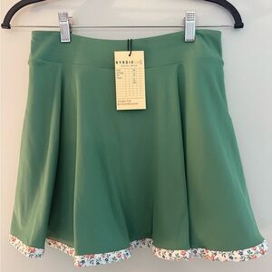 Green Byrdie Golf Skort with Pleated Design